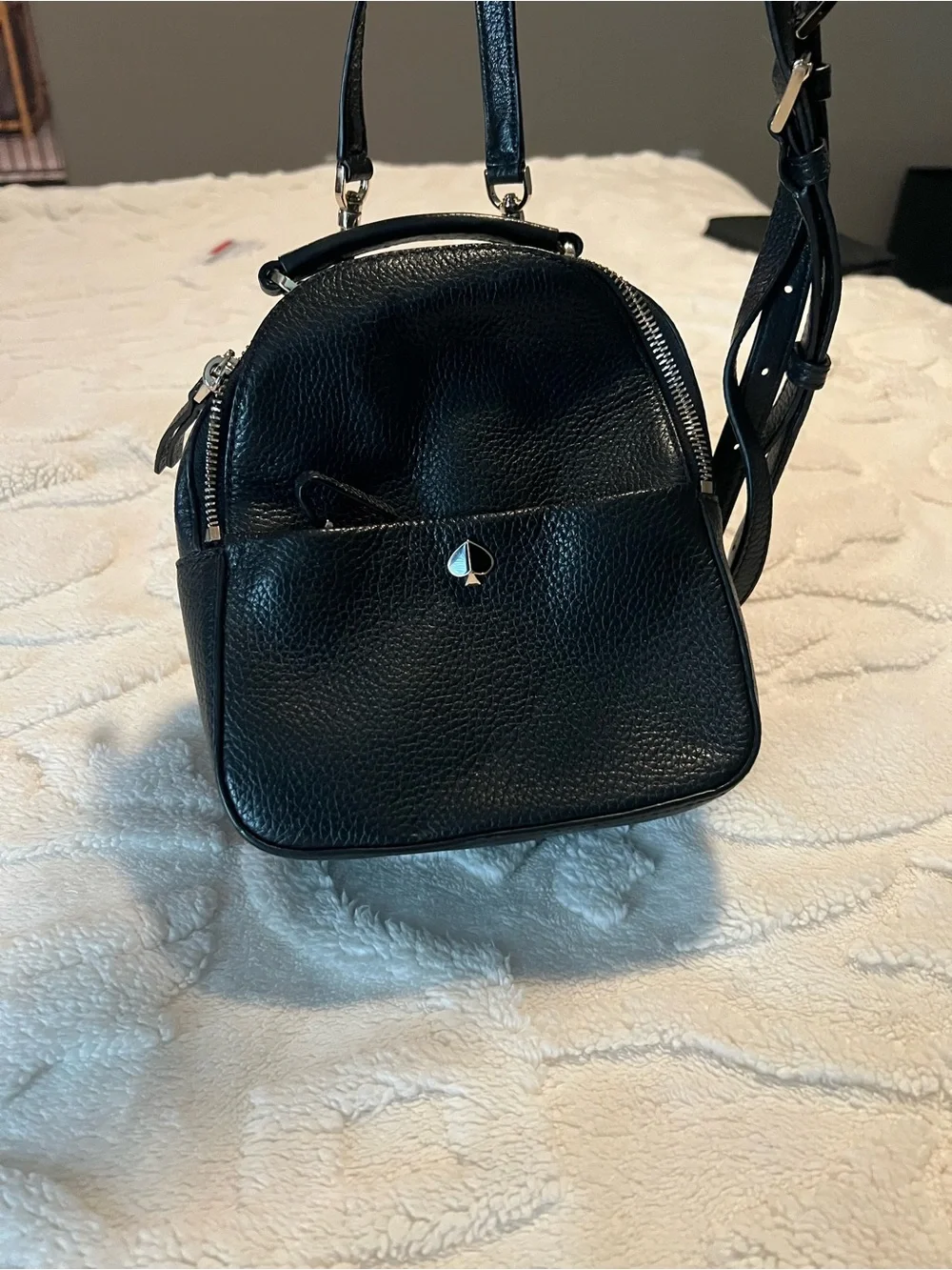 kate spade Black Pebbled Leather Mini Backpack with Spade Logo